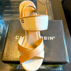 Selling these brand new Wedges. Never worn, classy work shoe.